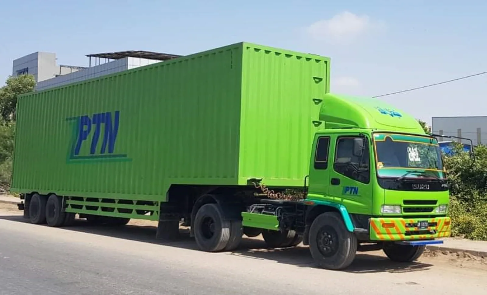 PTN lime-green container truck