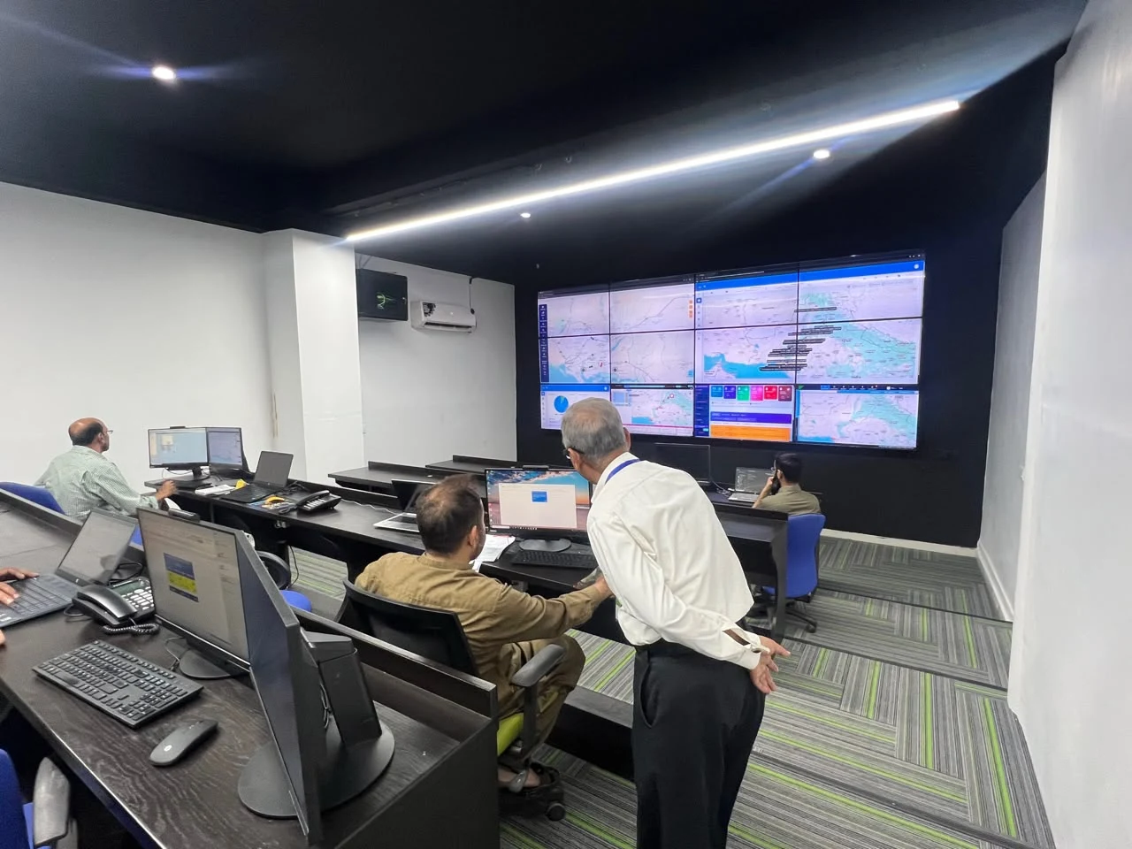 PTN Nerve Centre team monitoring fleet maps and operational dashboards